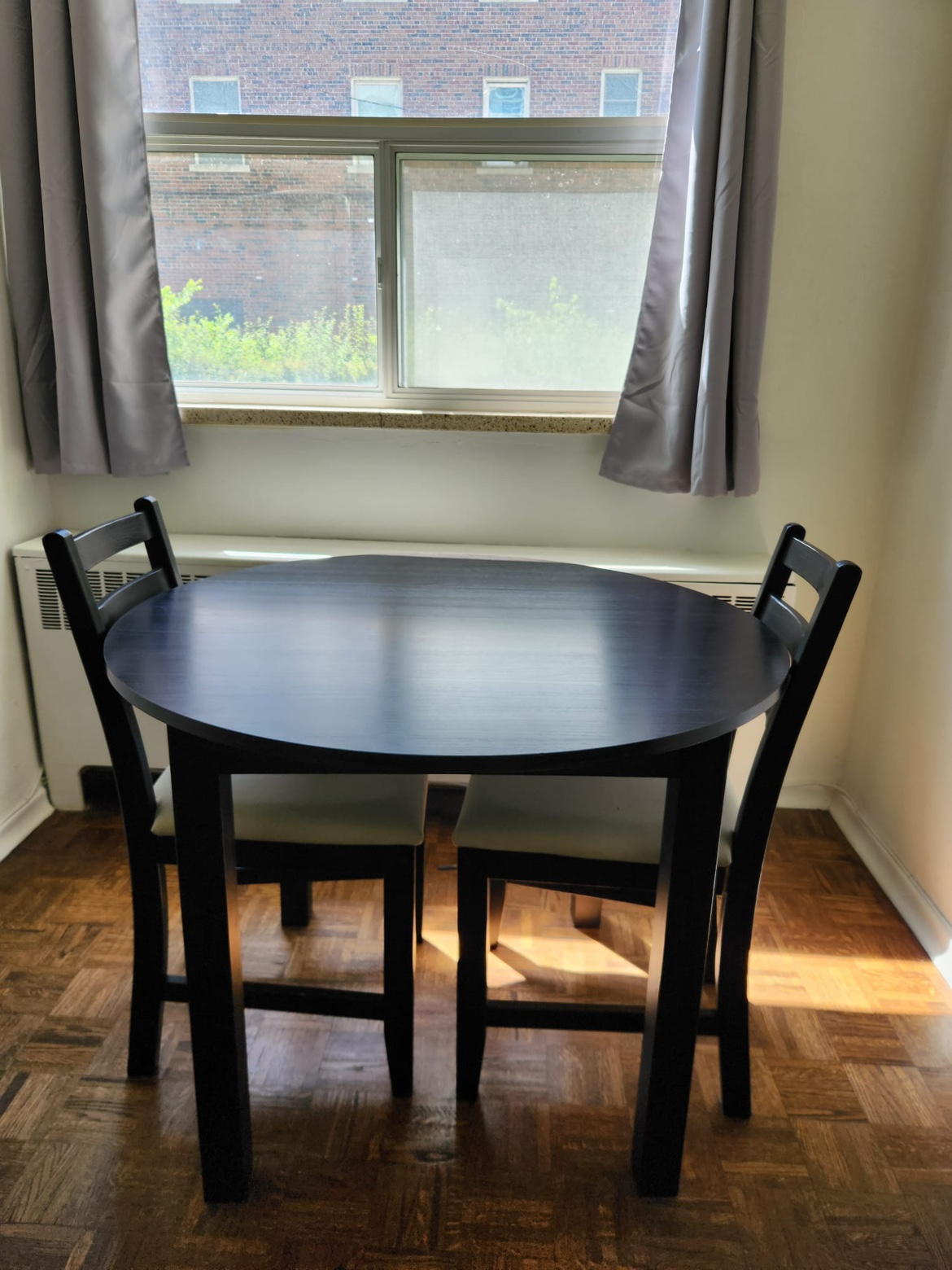 Dining table including 2 chairs