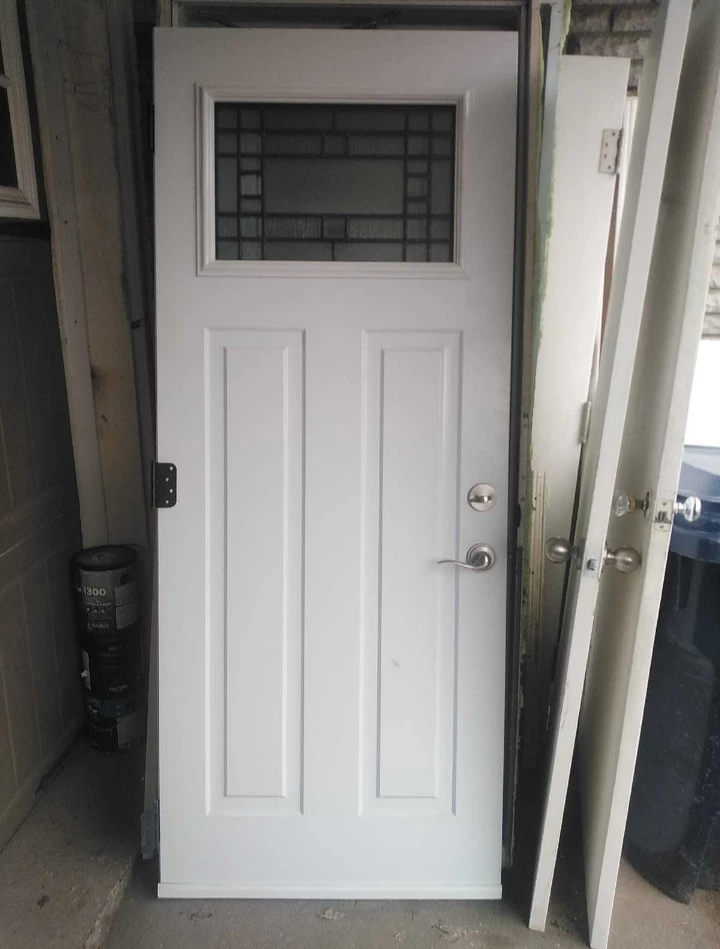 Exterior door with fram and storm door - photo 2