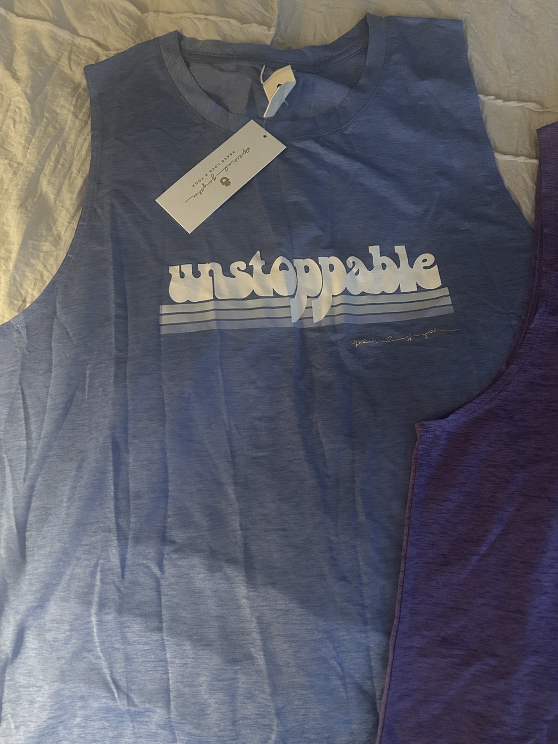 PELETON BRAND TANK TOPS image indicator(2)