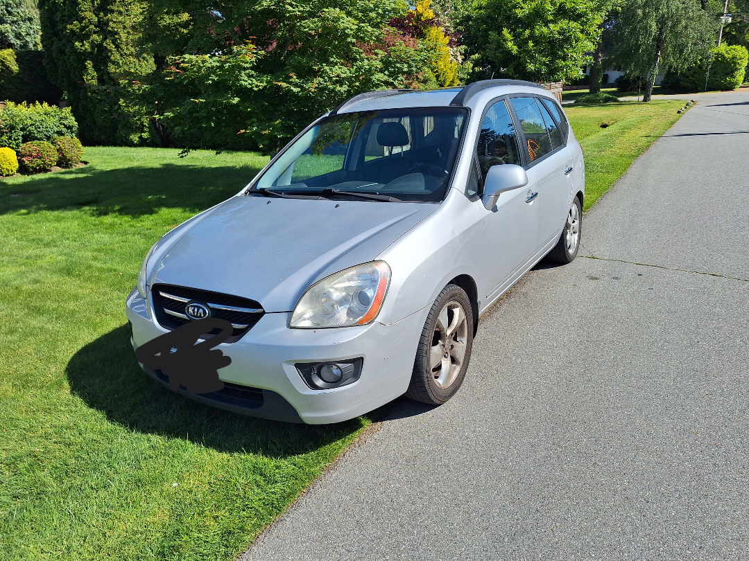 READ THOROUGHLY Kia rondo 08