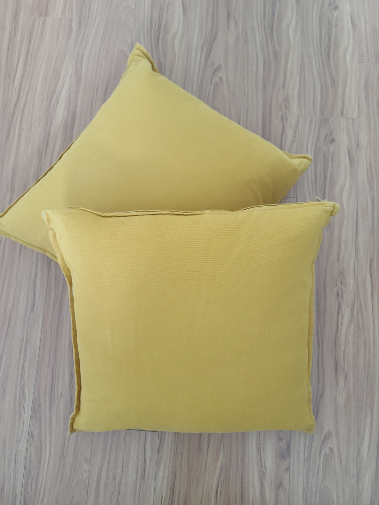 Two mustard color throw pillows thumbnail