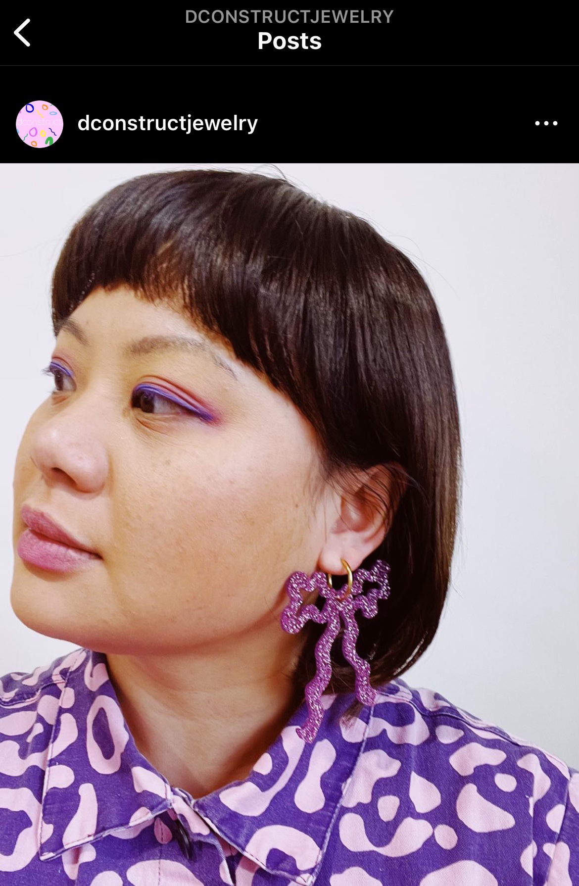 dconstruct big sparkly pink wavy bow earrings image indicator(3)