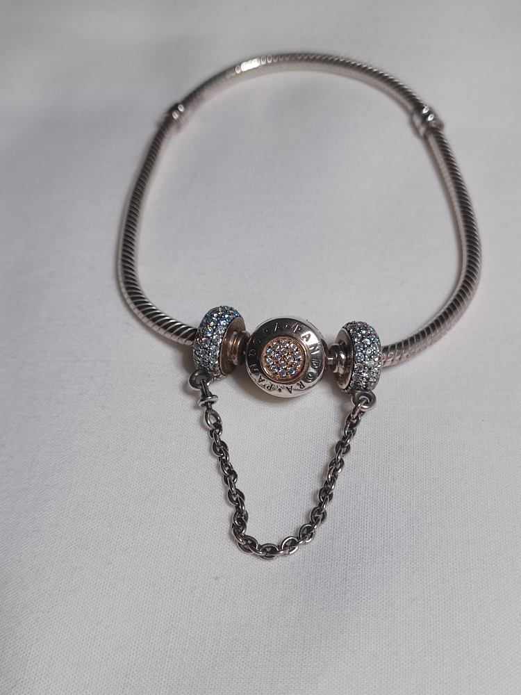 Pandora bracelet with safety chain used unisex