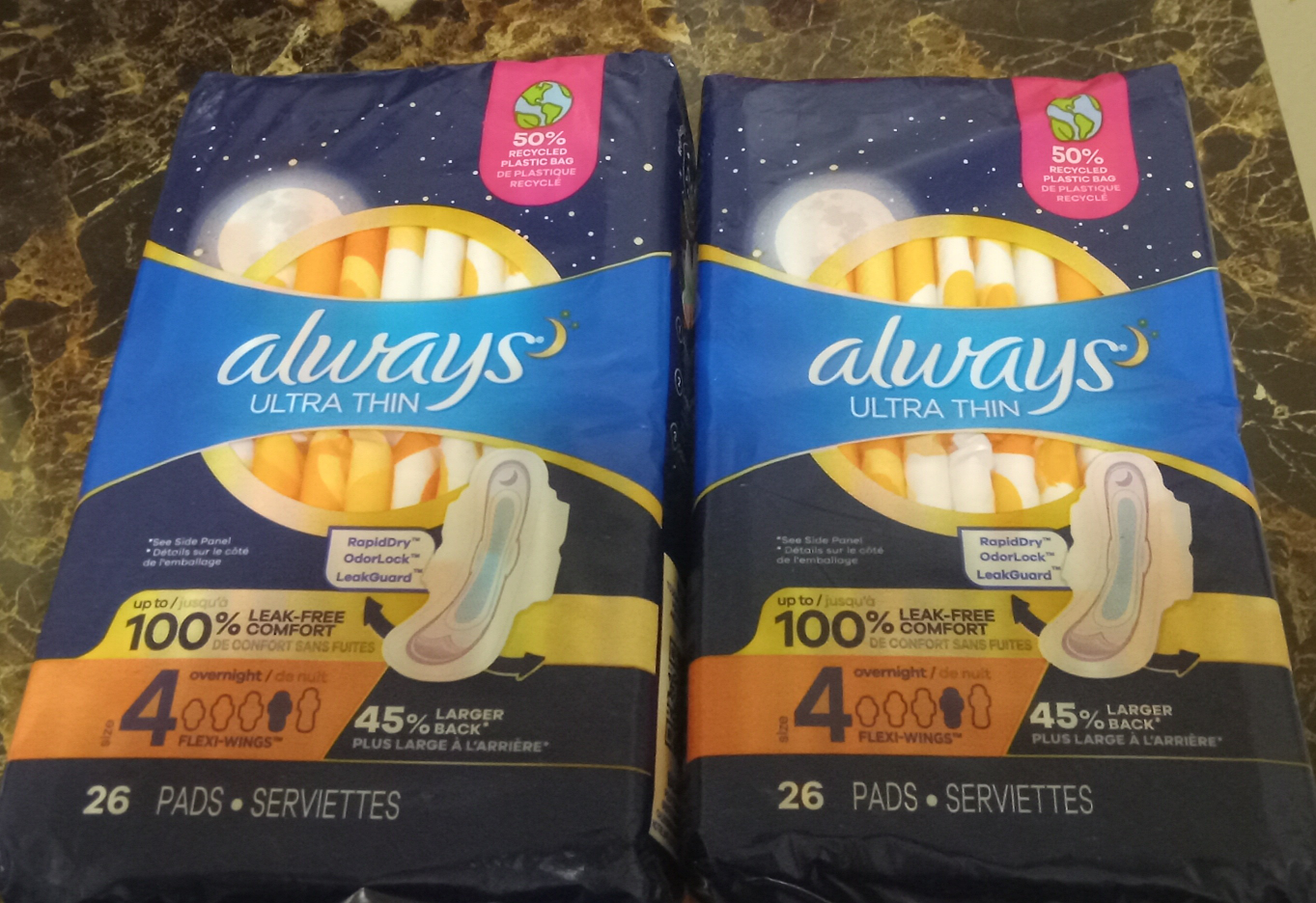 Two Packs of Always size 4 overnight pads (26 pads per pack) thumbnail