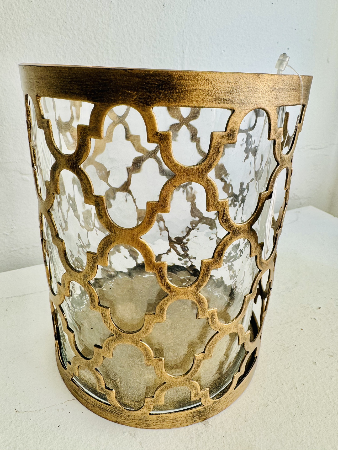 Antique metal candle holder