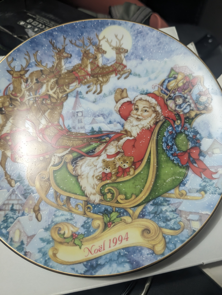collectible plates display of Christmas classics