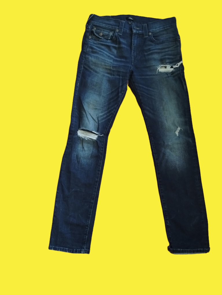 Adult male destroyed jeans