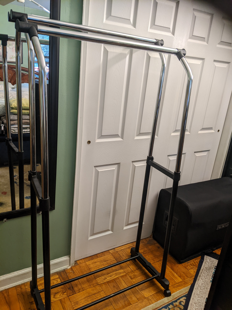 double clothes rack on wheels