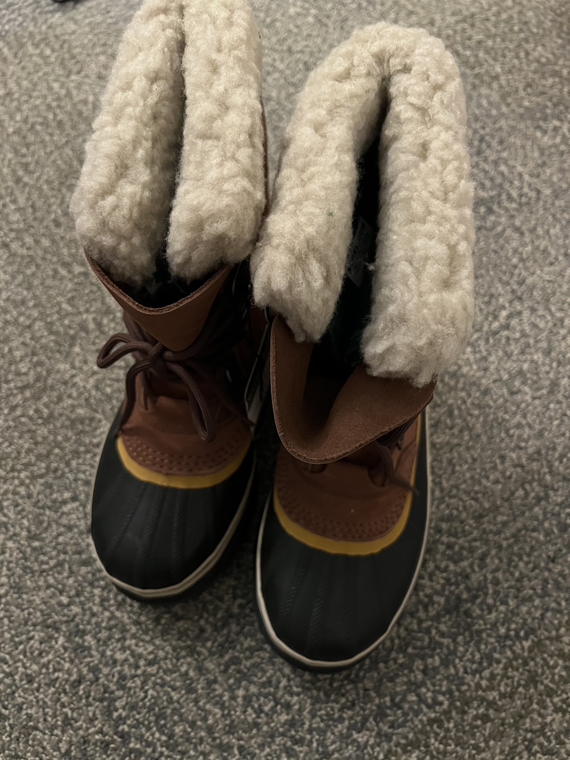 Sorel boots never worn with altags