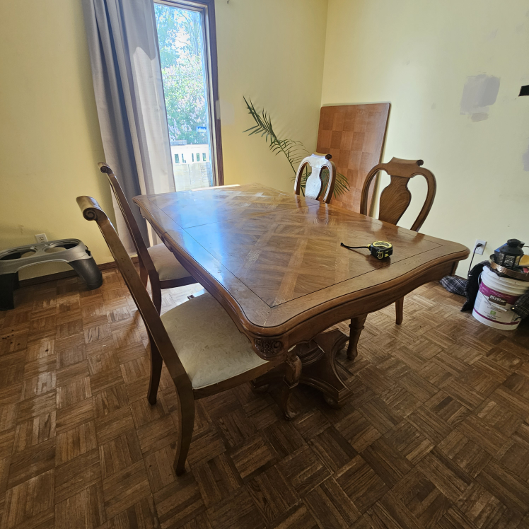 large oak dining room table and 4 chairs