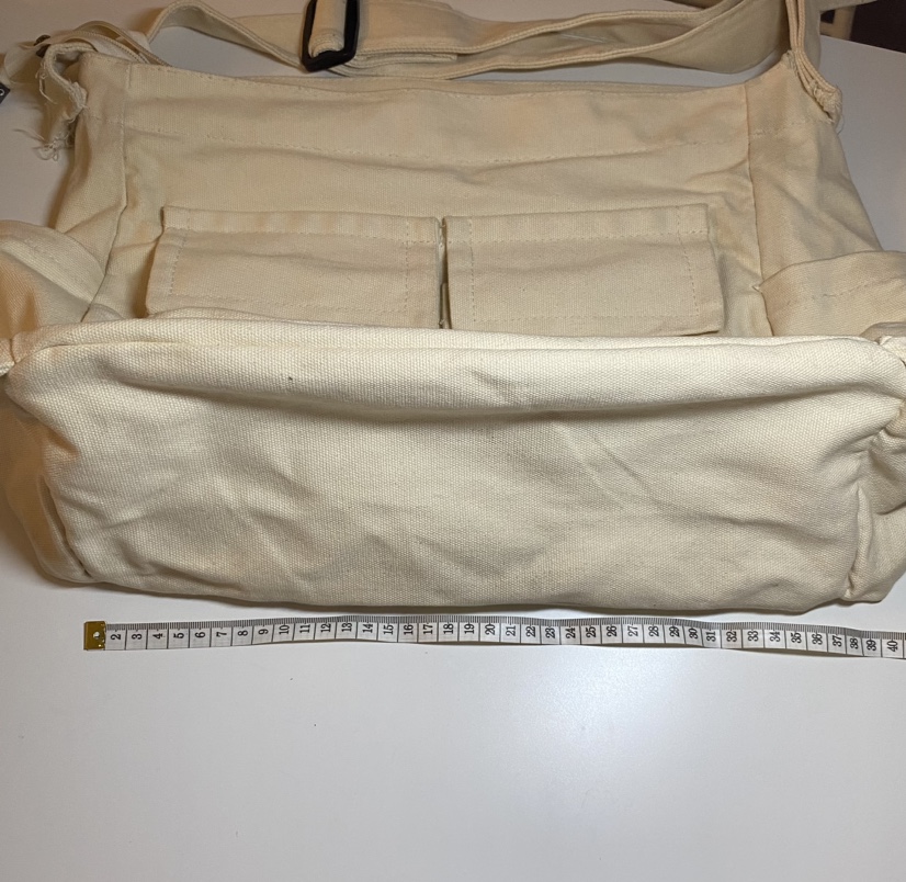 Large canvas messenger bag, fits laptop, completes cute outfits💫 image indicator(3)