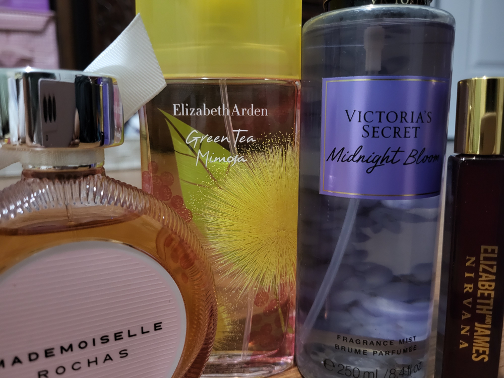 Lightly used Perfume and new makeup bundle - photo 2