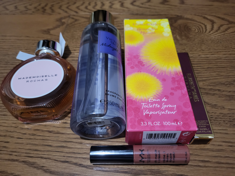 Lightly used Perfume and new makeup bundle