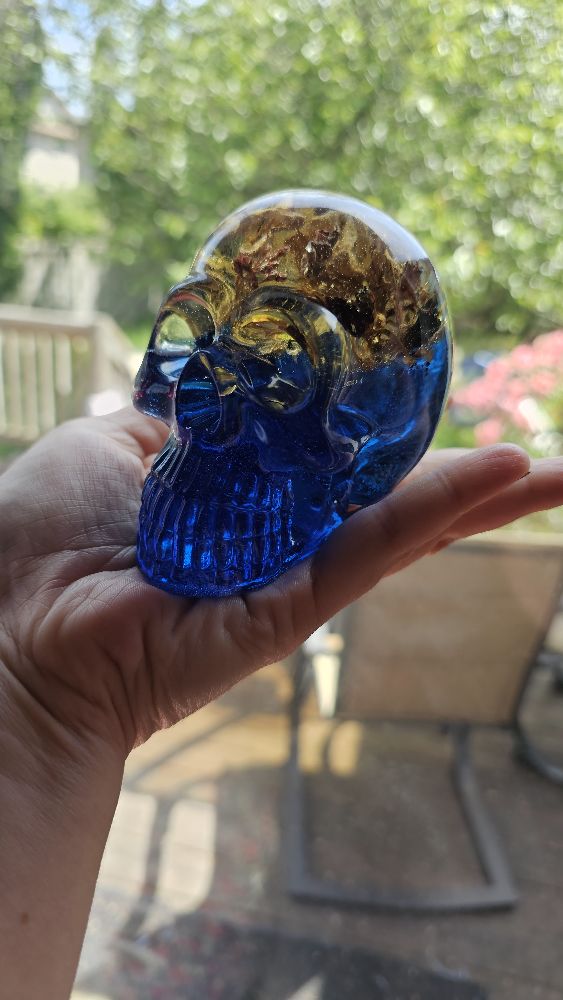 Blue floral resin skull
