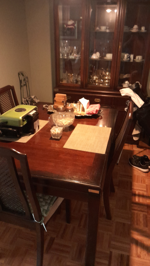 Family dining table with 6 chairs and a matching cabinet