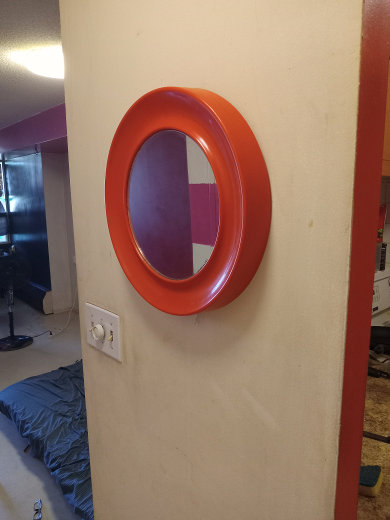 Vintage  funky bright orange mirror