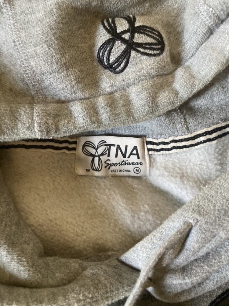 TNA Hoodie size M *see pics of sleeve, lighting made look dirty image indicator(3)
