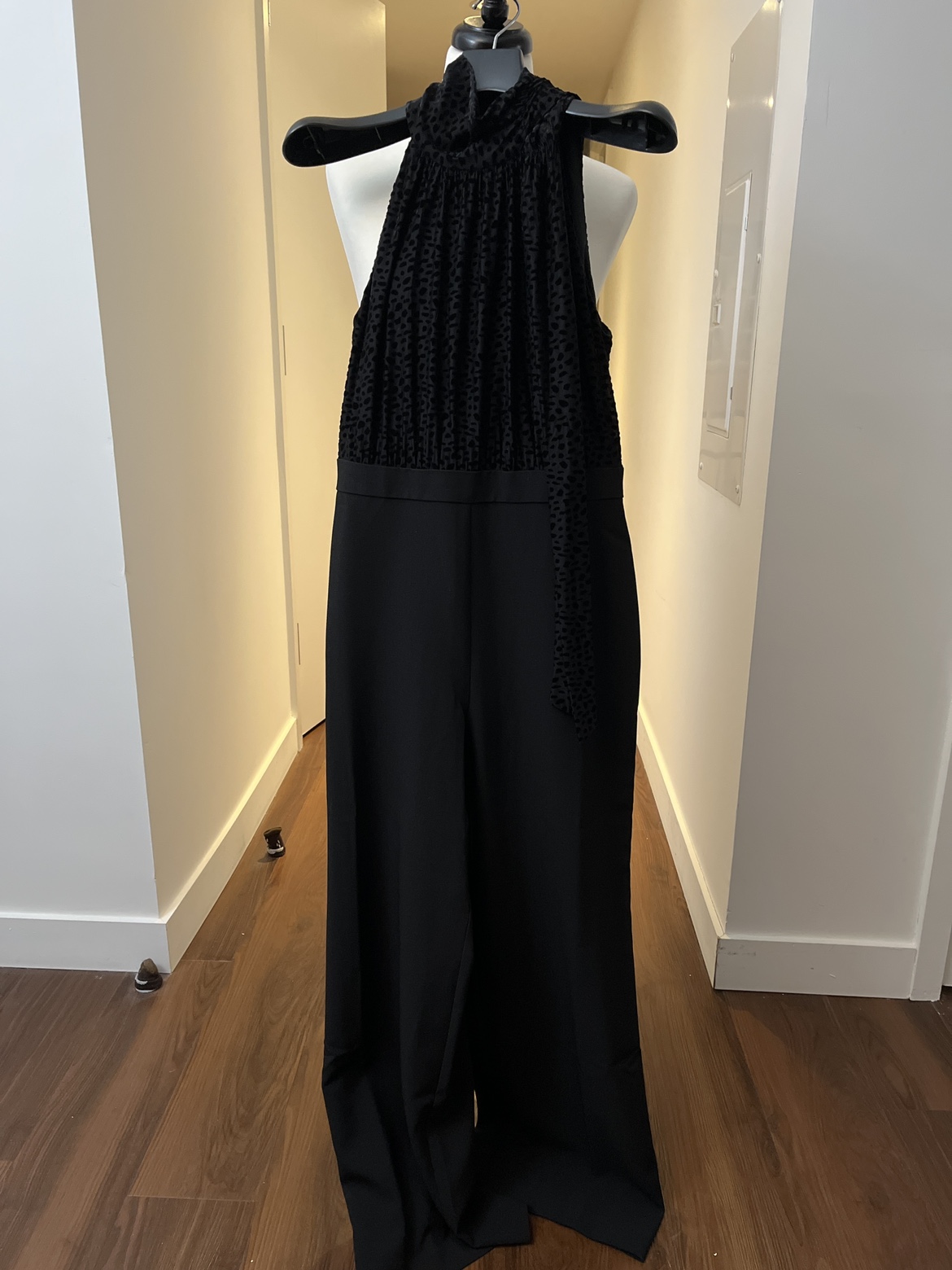 Woman long black romper image indicator(2)