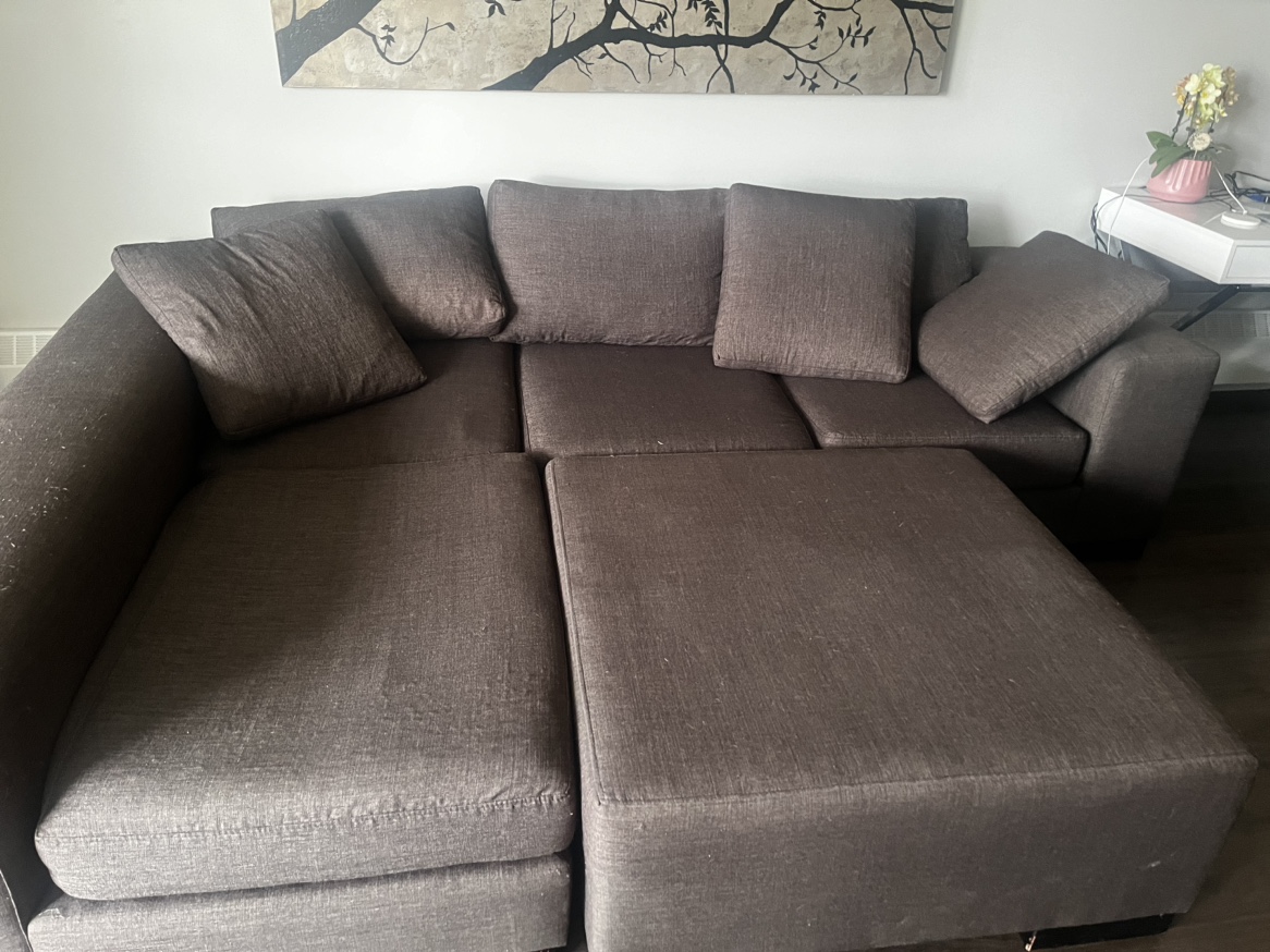 Large dark grey sectional with ottoman - photo 2