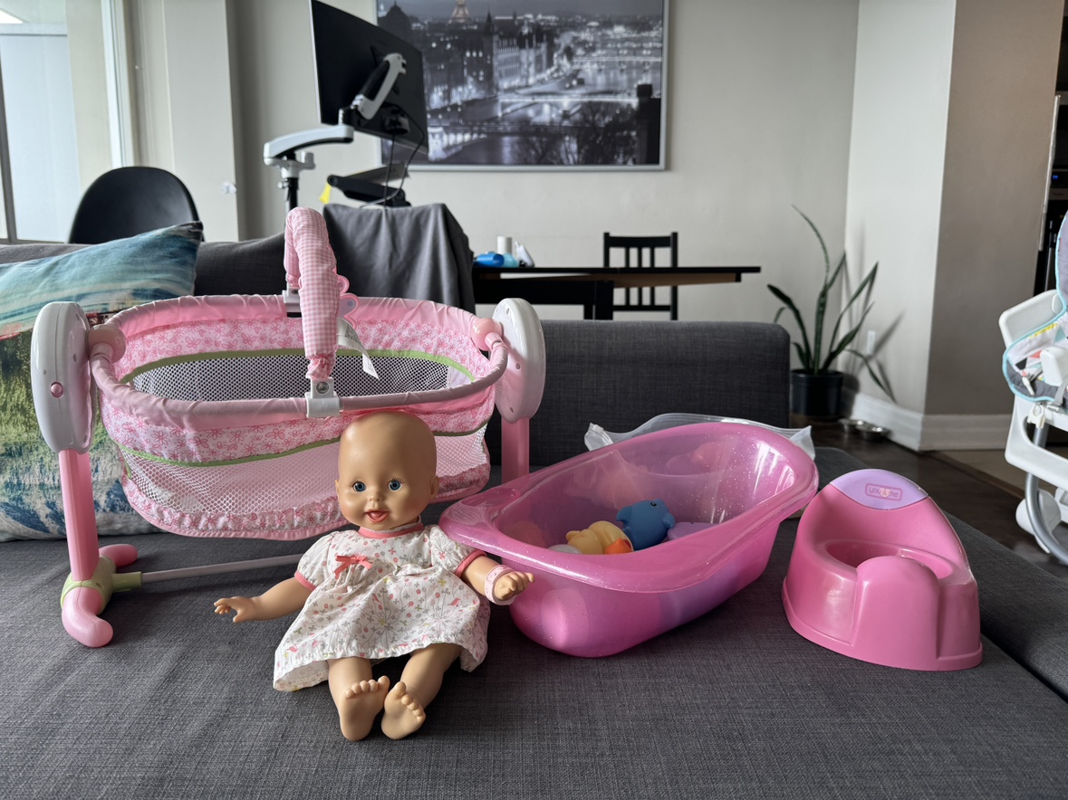 Doll and doll bassinet, bath accessories and doll seat