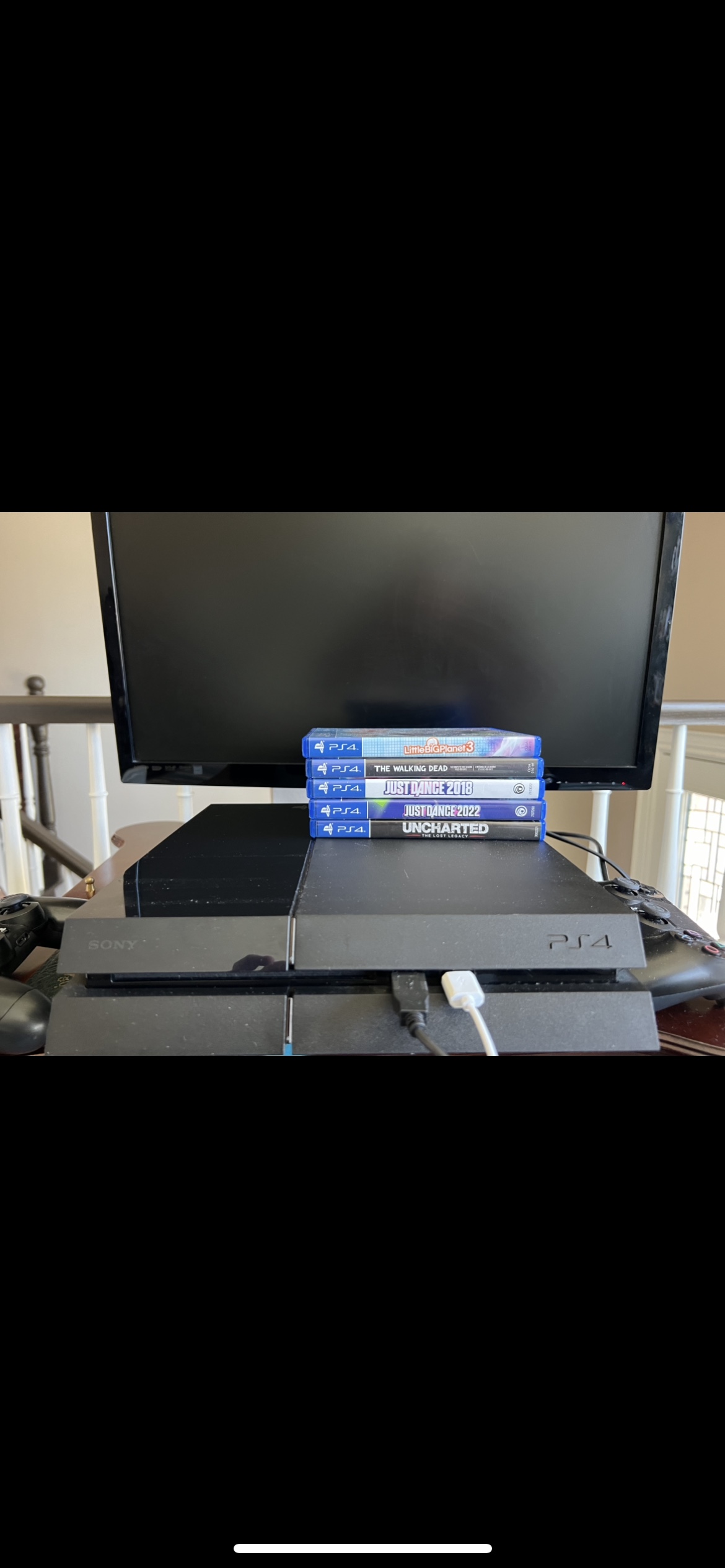 PS4 great condition games cords and controllers