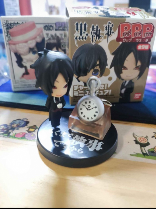 $6 black bulter anime figures x2, small