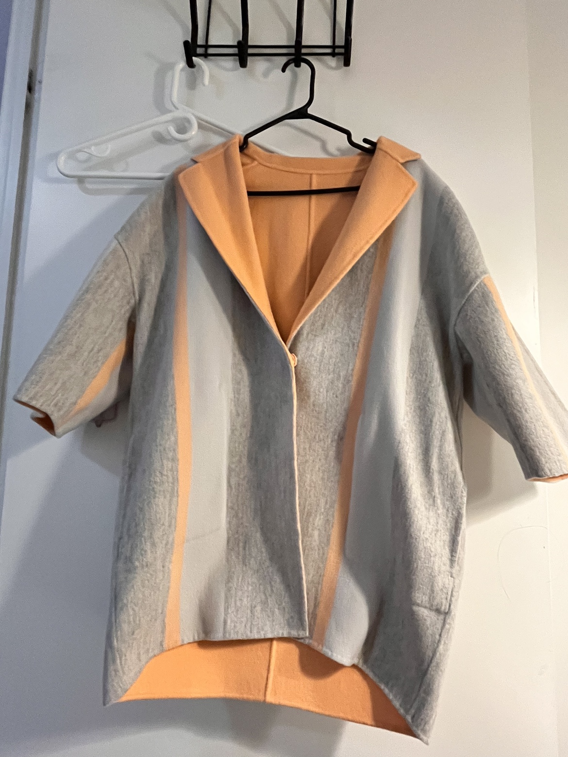 reversible double sided salmon and grey wool coat image indicator(2)