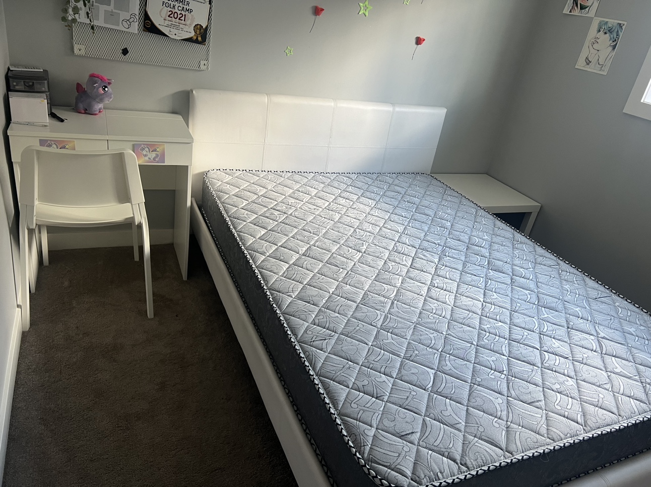Bed, study table and chair and one corner table.