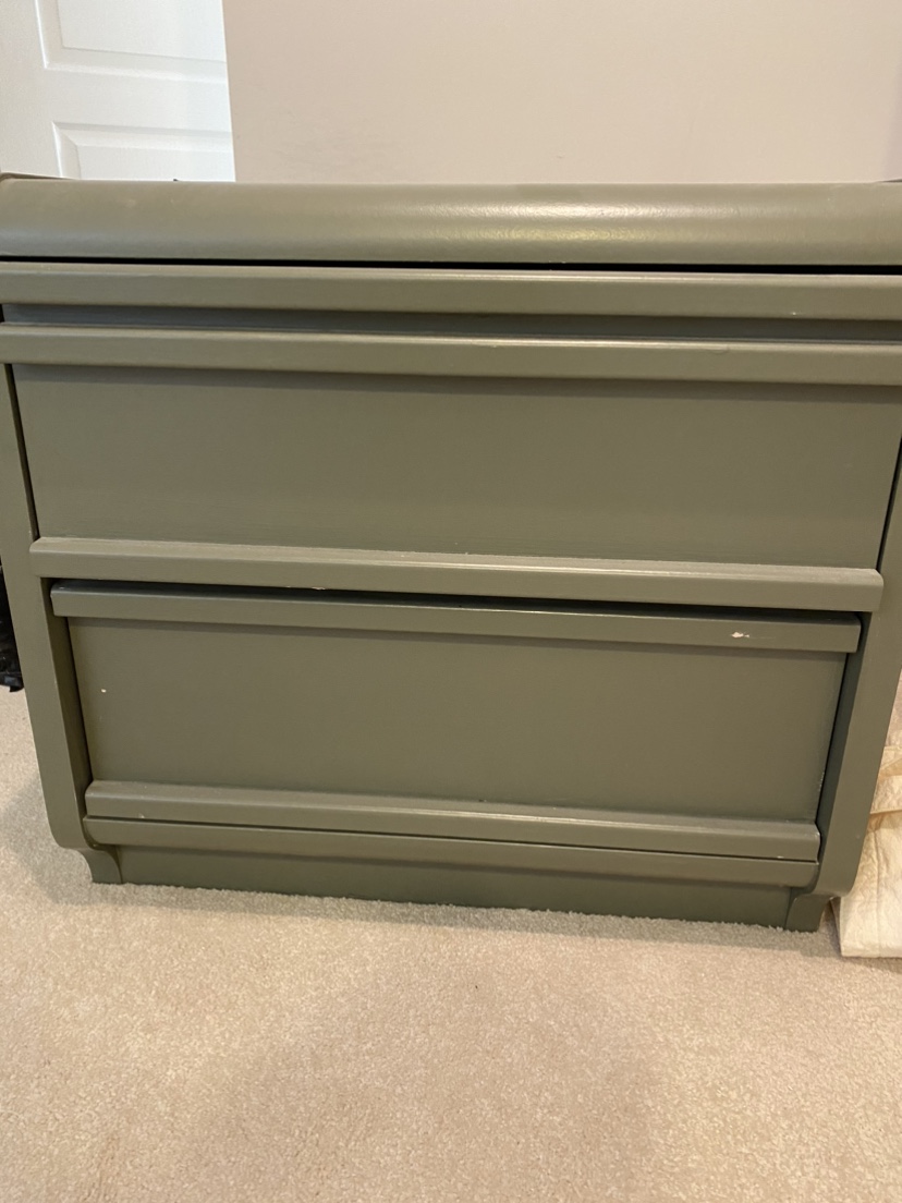 Side table in a gray was by palliser