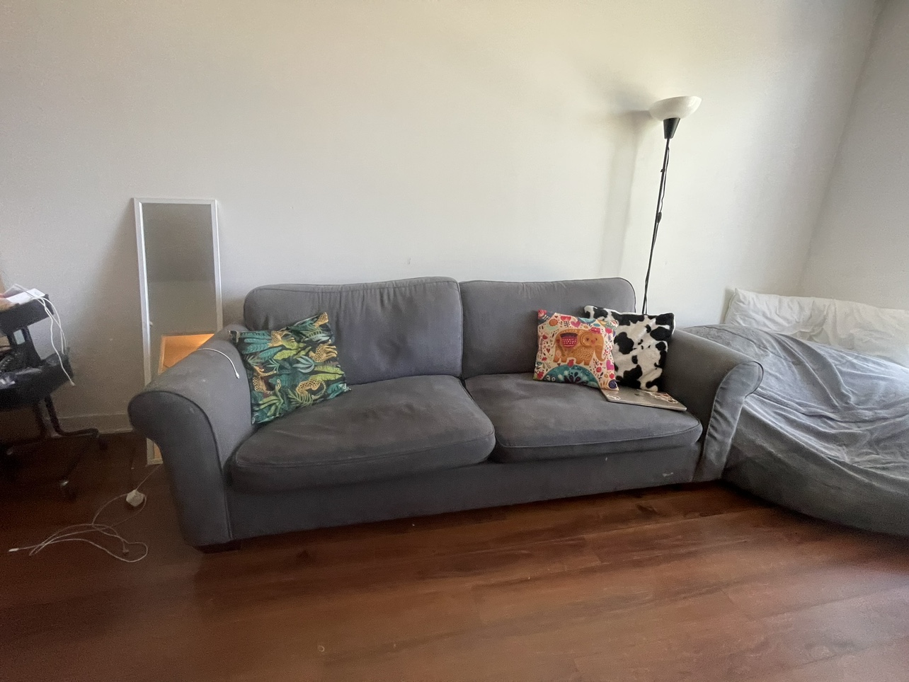 Grey three seater sofa couch