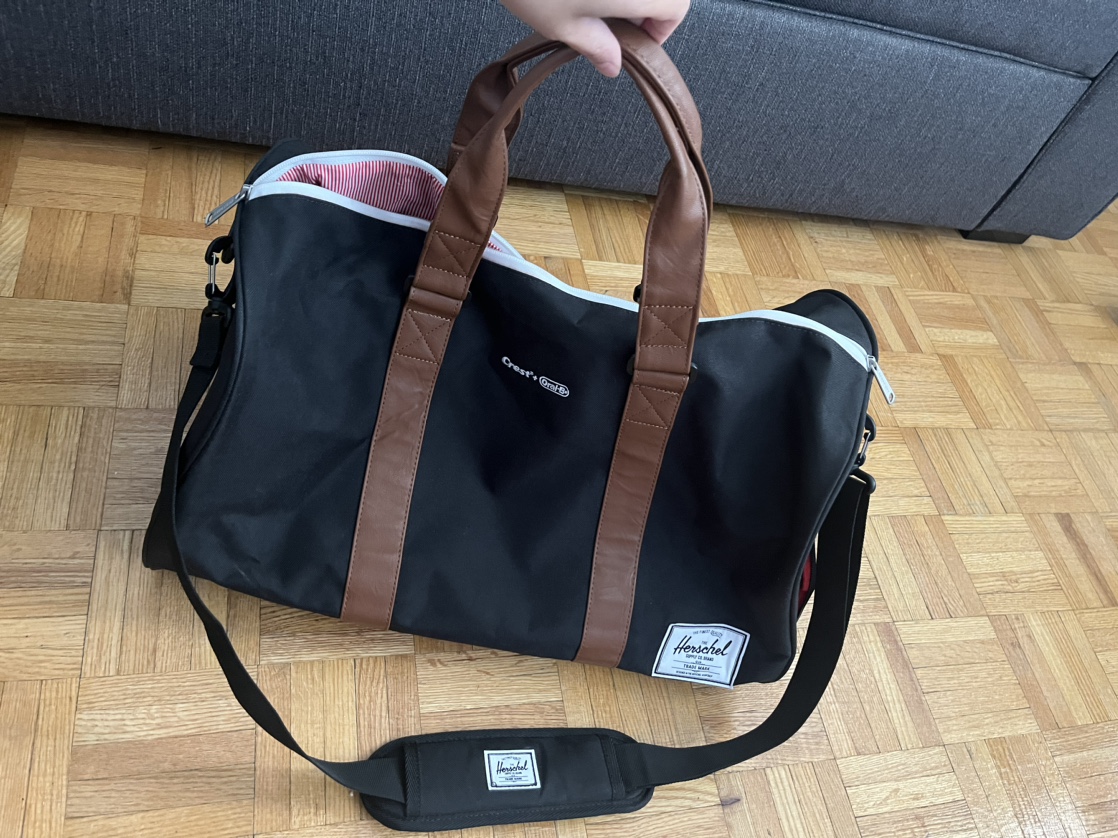 Large Hershel duffel bag in black and brown