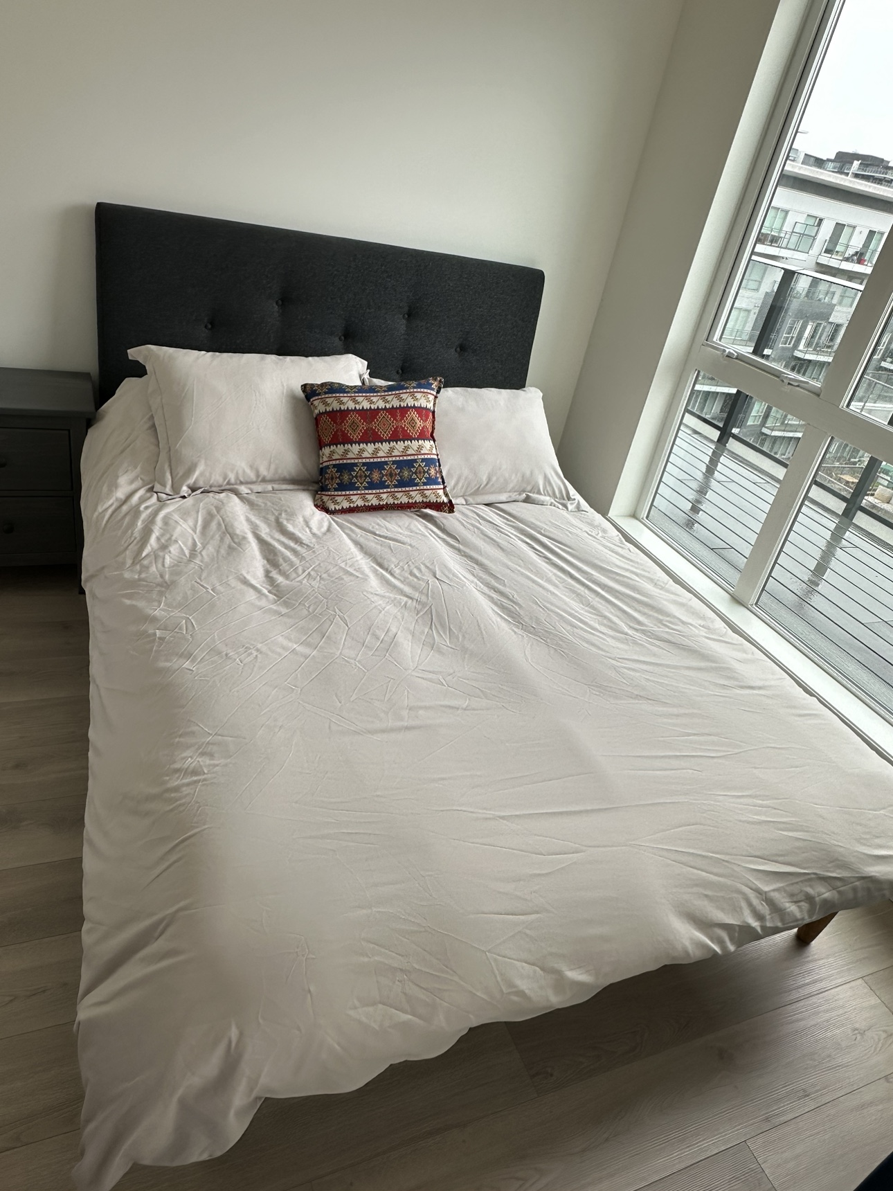 Queen bed with mattress.