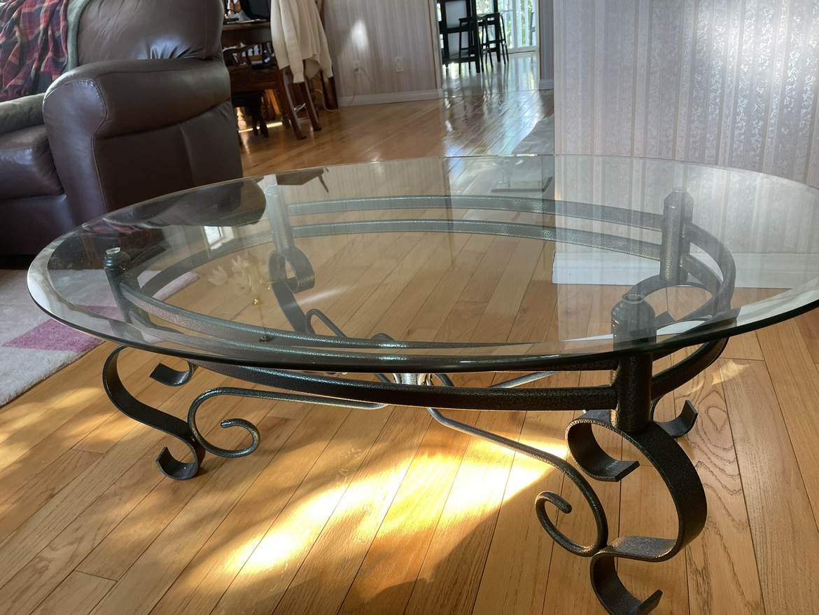 Oval glass top coffee table