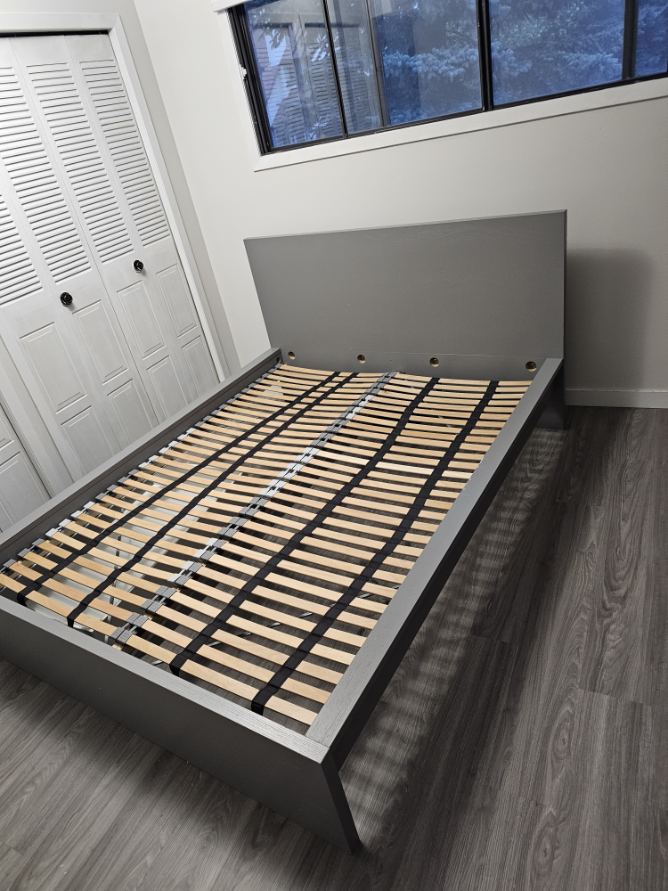 Queen sized bed frame with headboard