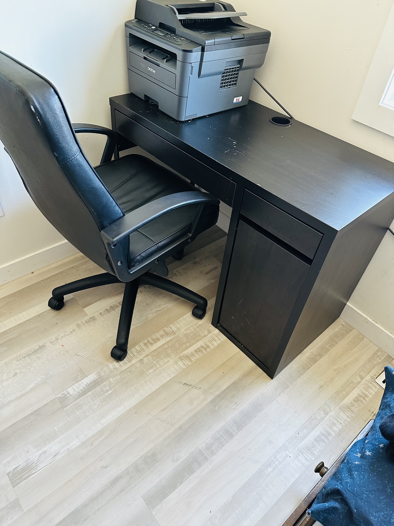 Brown desk with chairs