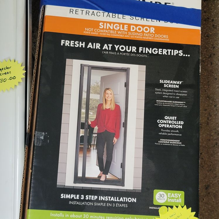 Retractable Screen Door - New never used - photo 2