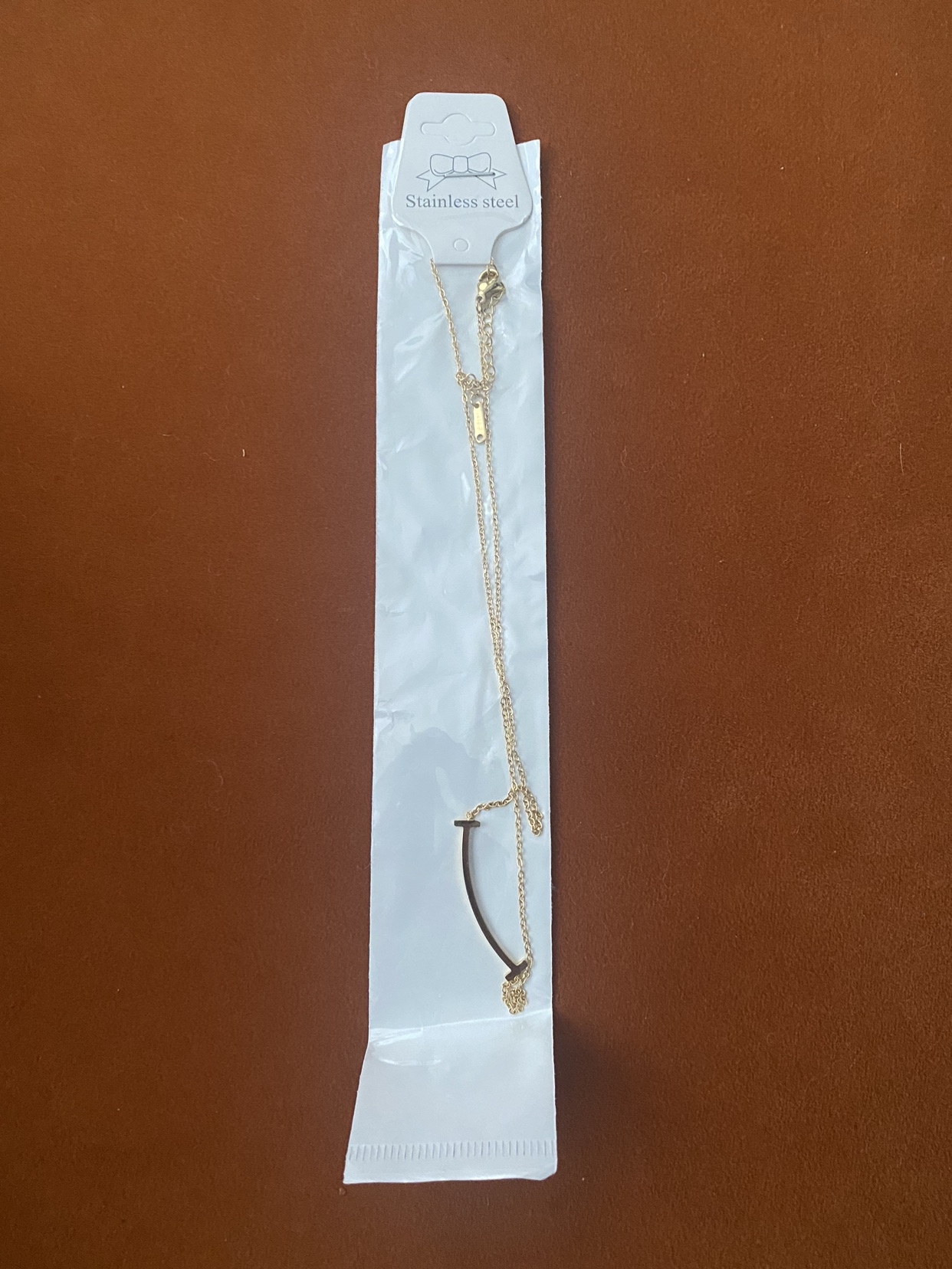 Gold colour smile necklace