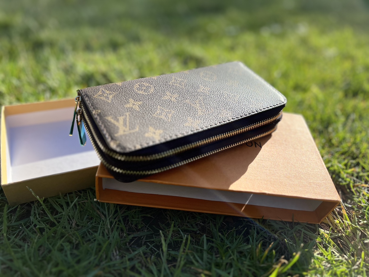 LV women’s clutch.
