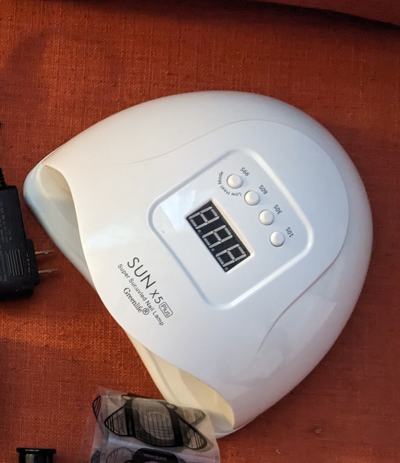 gel nail lamp and drill