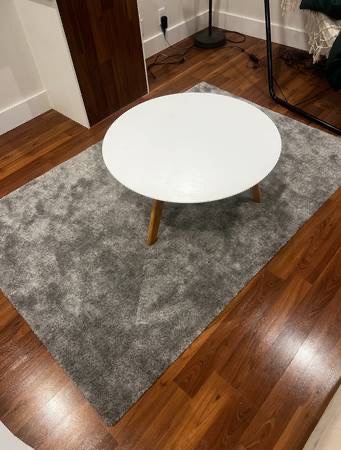 Grey low pile area rug