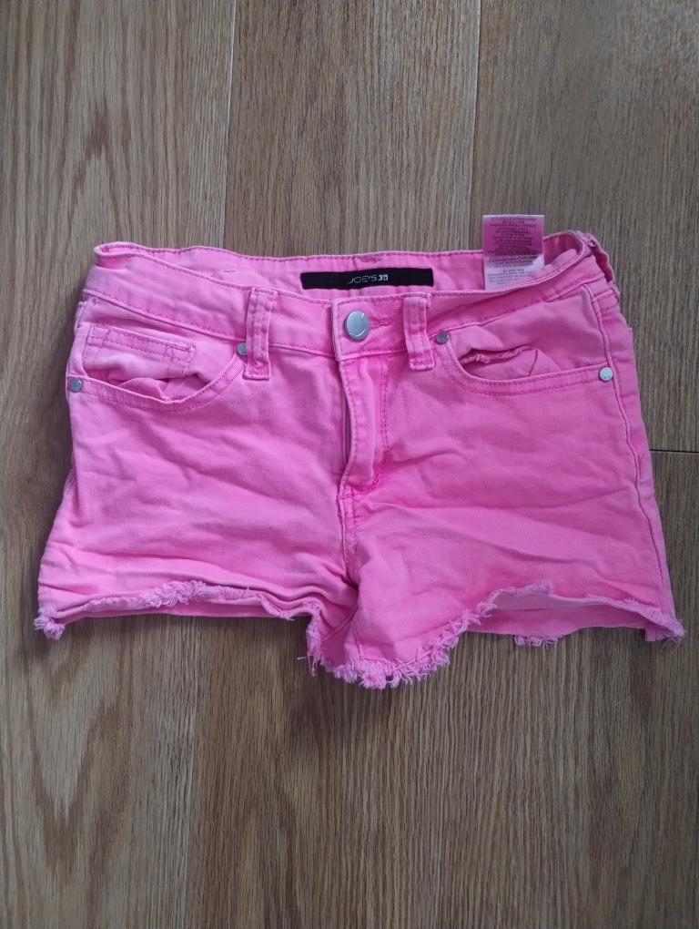 Pink female kid jeans pant.