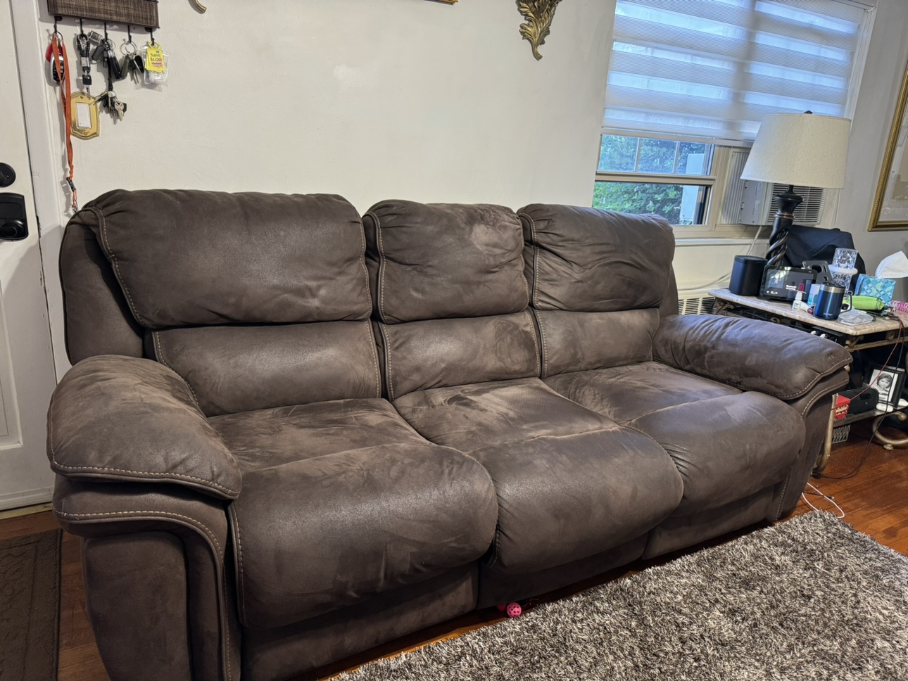Brown couch and loveseat power recline