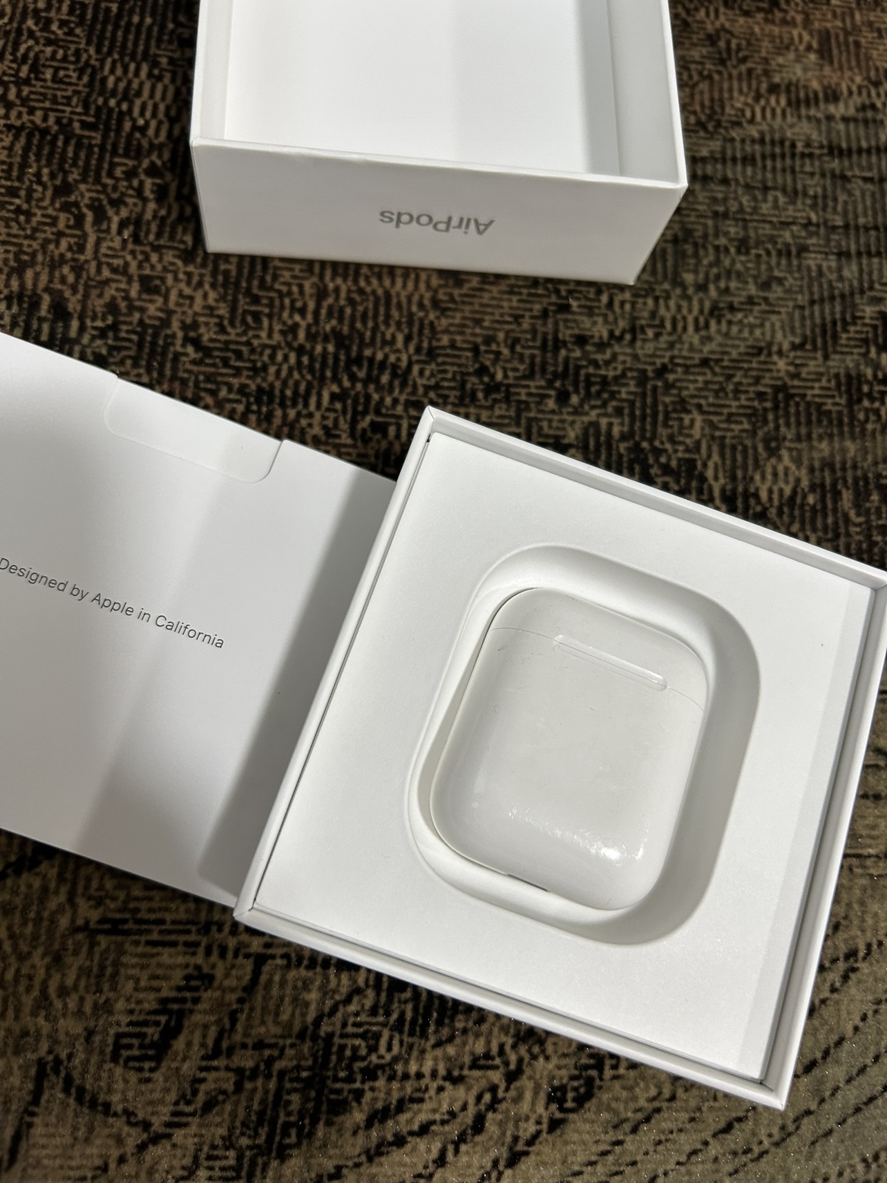 AirPods with a charging case - photo 4
