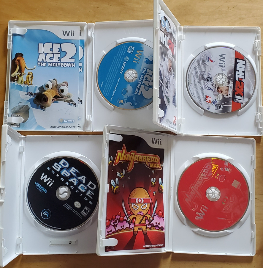 Set of 4 Nintendo Wii games image indicator(3)