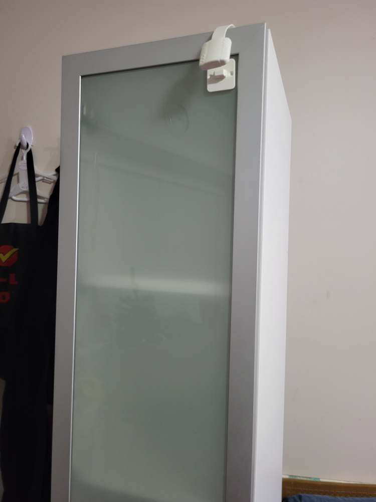 Tall slim white cabinet with metallic door - photo 4