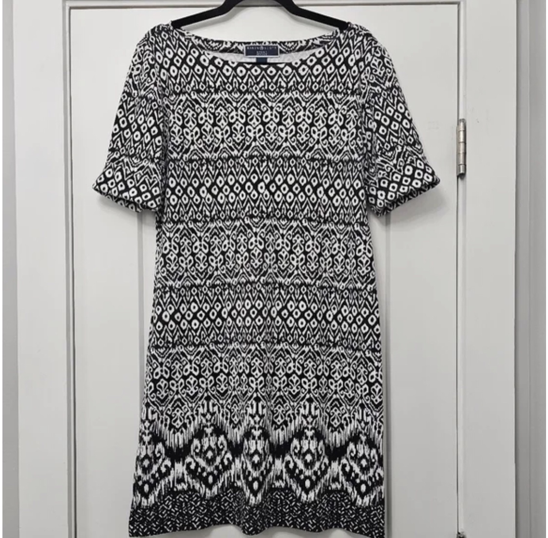 Brand new dress with short cuffed sleeves