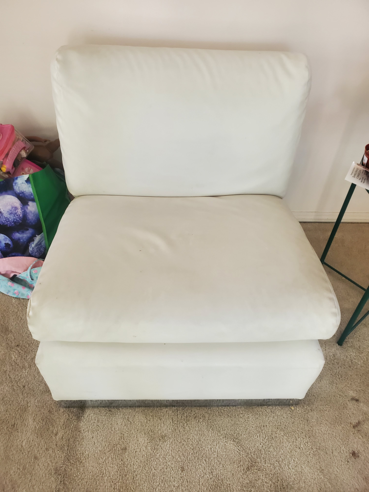 2 single white leather couches