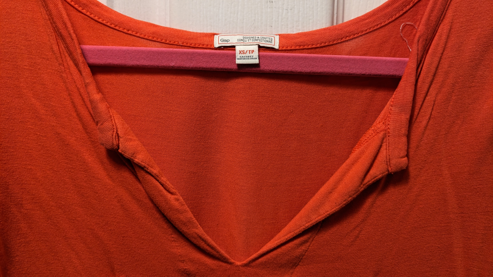 orange 3/4 length sleeve shirt image indicator(2)
