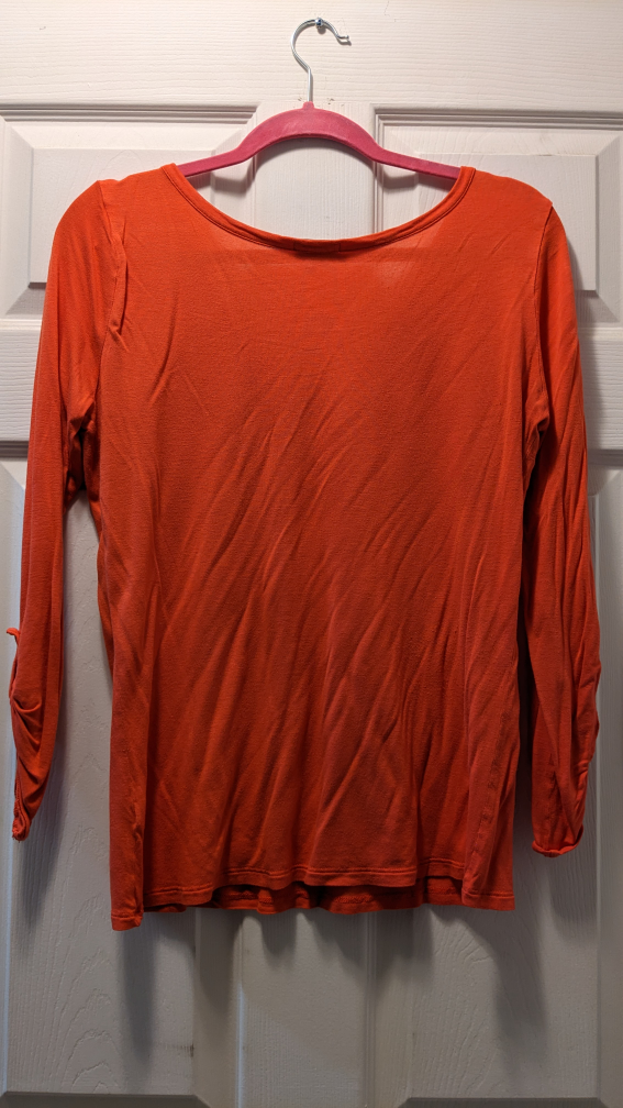 orange 3/4 length sleeve shirt image indicator(3)