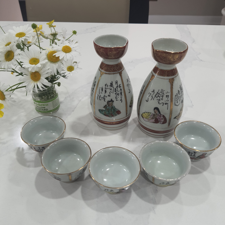 7 pc vintage Japanese sake set, including 2 bottles and 5 cups